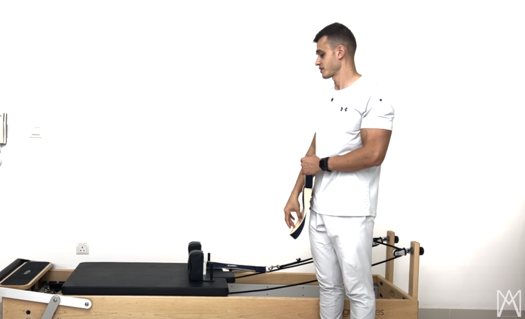 53. CREATIVE STRAP ROWS ON THE REFORMER